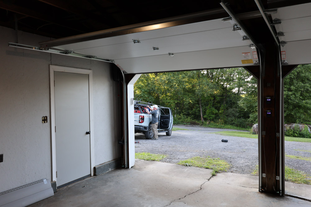 Bear Door Services technician on-site installing a garage door