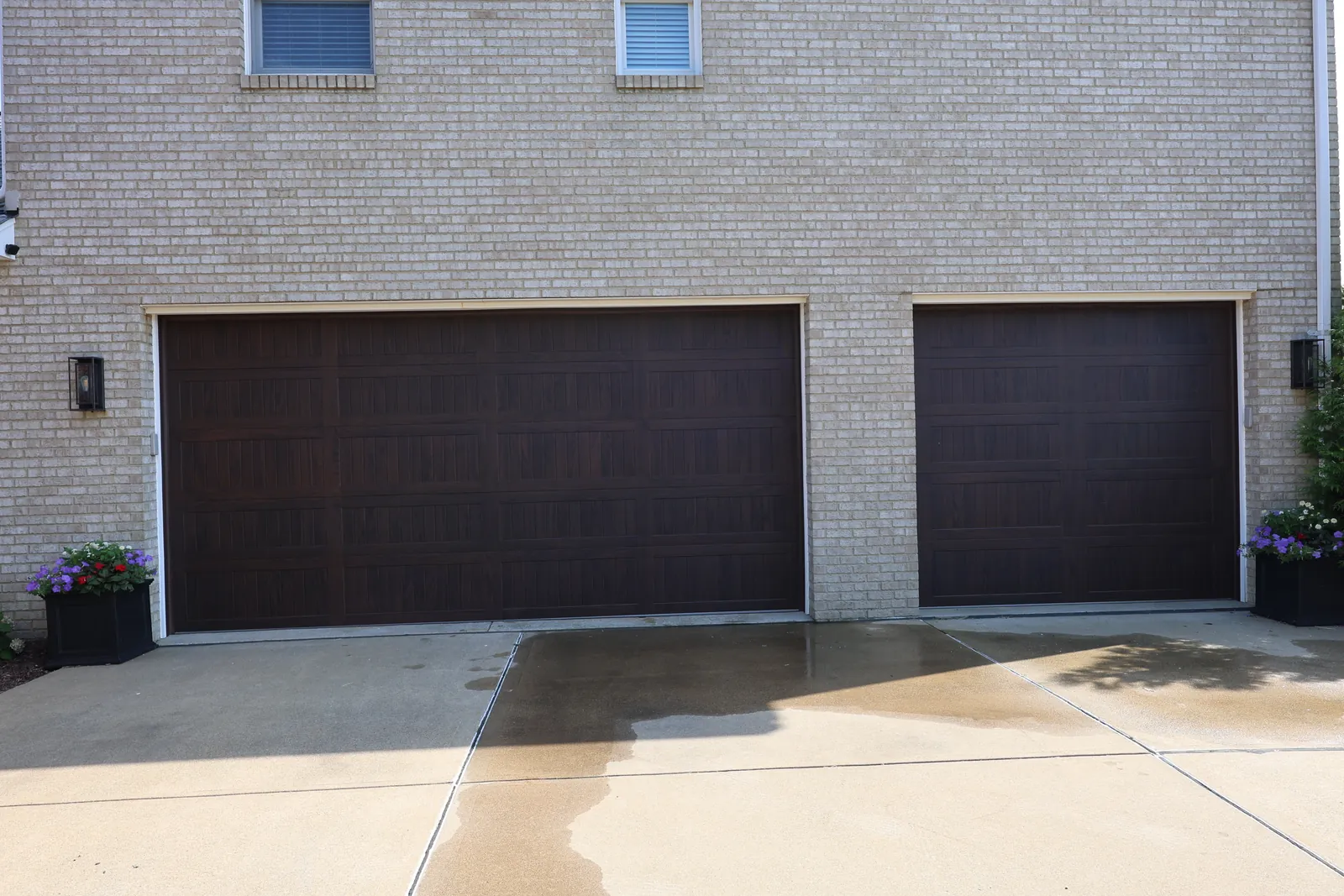 Custom carriage-style garage doors serviced by Bear Door Services