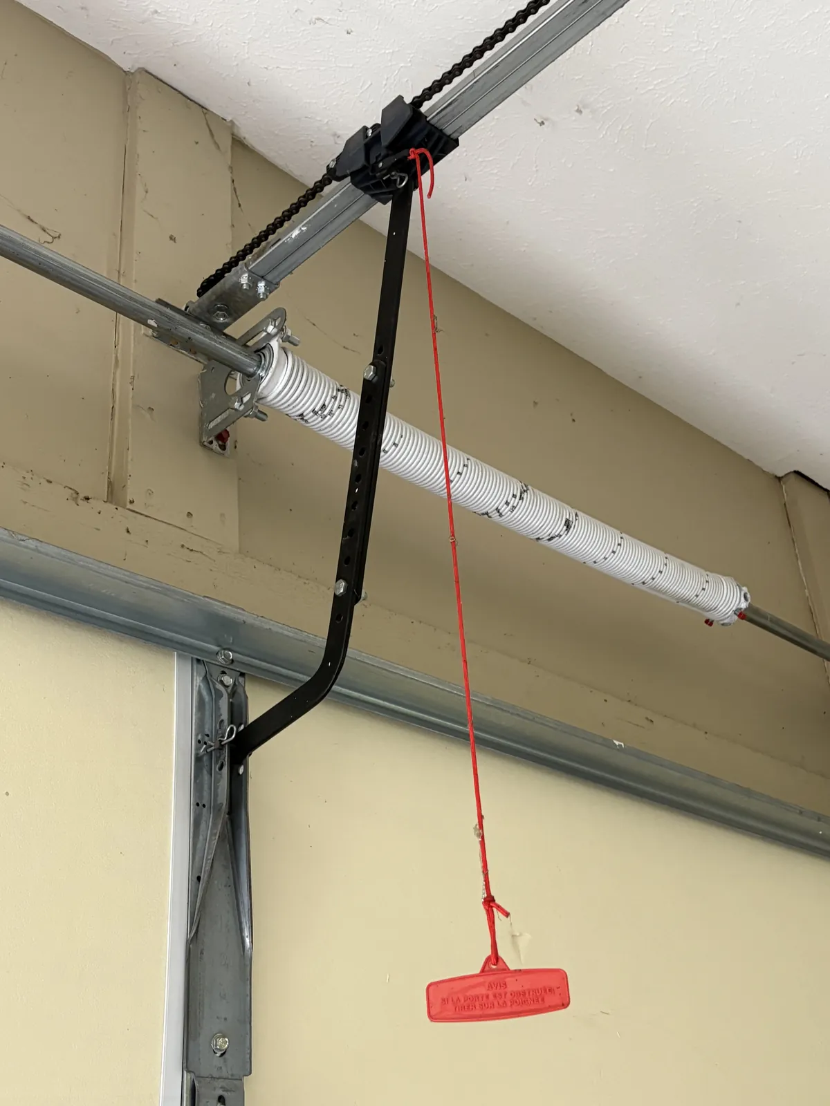 Broken spring replaced with a premium BEARMAX torsion spring