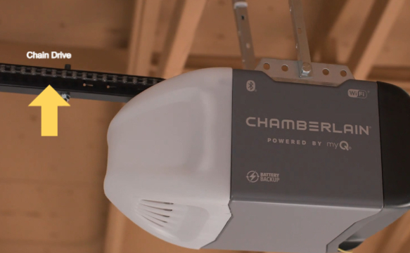 Close-up of a chain drive garage door opener installed by Bear Door Services, illustrating the components involved in garage door upgrades and repairs.
